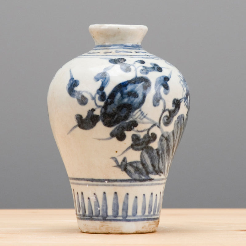 SMALL BLUE & WHITE VASE WITH FLORALS