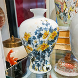 SMALL VASE WITH MARIGOLDS