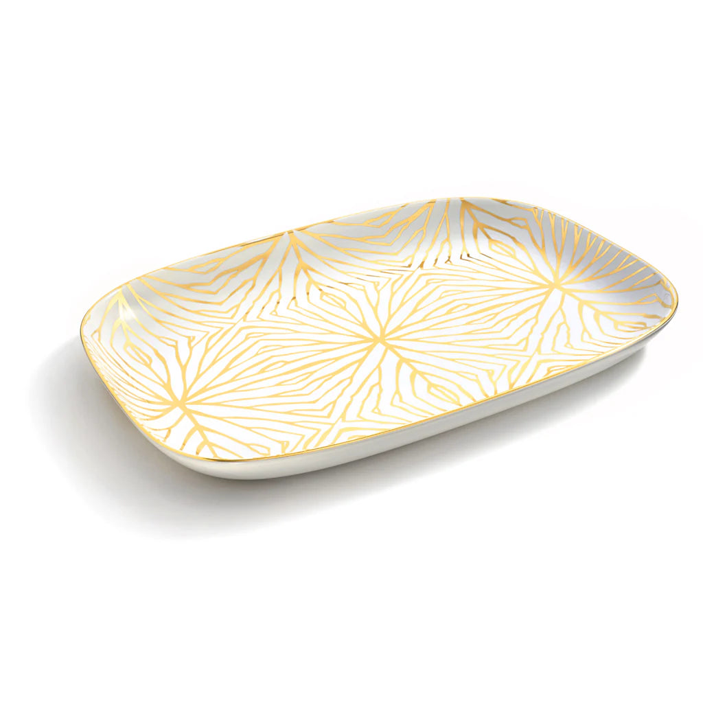Our Lily Pad serving platter is designed to hold anything your heart desires: appetizers, bowls of delicious food, or even grilled salmon. Its design is inspired by the organic branching of the Giant Lily Pad, a surprisingly delicate, yet strong, plant found in the Amazon. At Talianna, it's our mission to bring joy to your life every day, one tray at a time, and to help your home feel just like you.

Ceramic with 24K Gold detail
18.25" x 13.25" x 1"
Imported