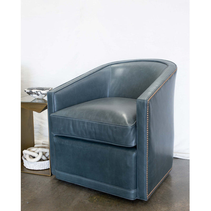 The Radcliffe Swivel Chair is one of our favorites for comfort and looks. It features a curved barrel back with sloped arms. This chair works well with fabric or leather. Duvall Atelier