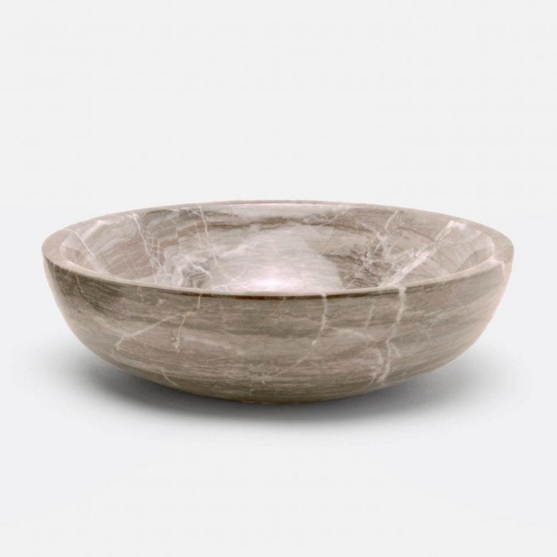 Smooth marble bowl in natural gray tones.