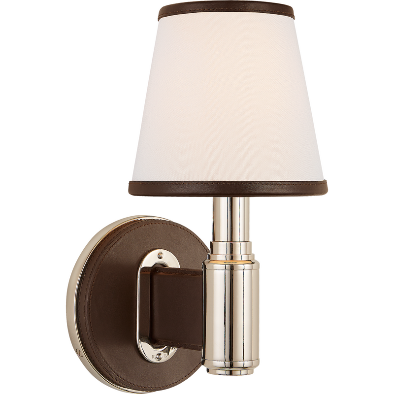 Visual Comfort Riley Single Sconce Finish: Polished Nickel and Chocolate Leather with Leather Trimmed Linen Shades/ Duvall Atelier 