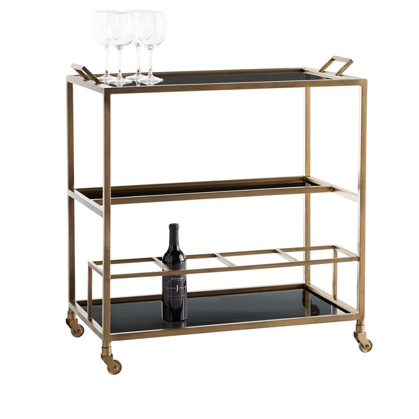 Jak Bar Cart - Duvall Atelier Multi-tiered, this antique brass bar cart offers extensive opportunities for styling. Perfect for parties, the black glass tray top is removable, taking martinis on the go.